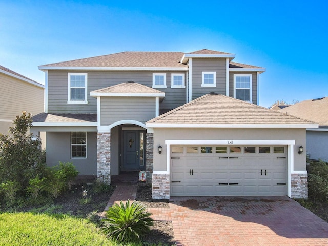 view of front of home with a garage