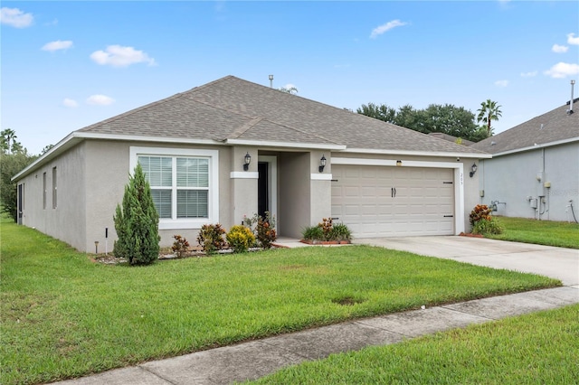 ranch-style home with a front yard and a garage