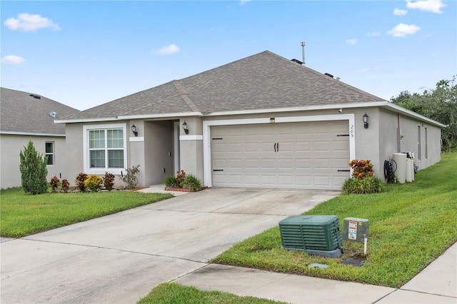 ranch-style house with a garage and a front lawn