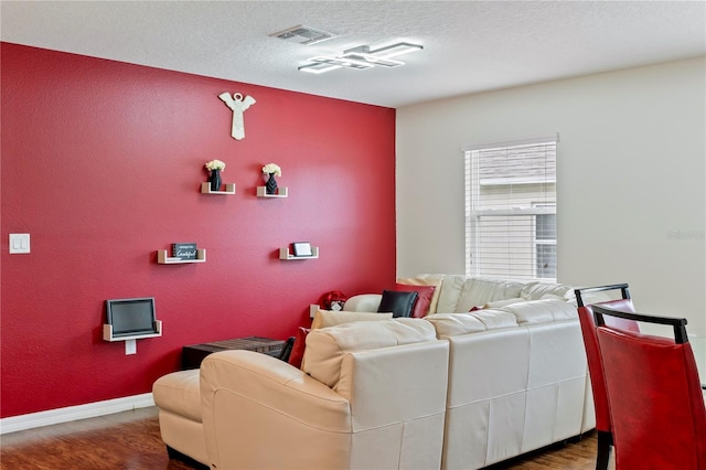 living room featuring dark wood-type flooring