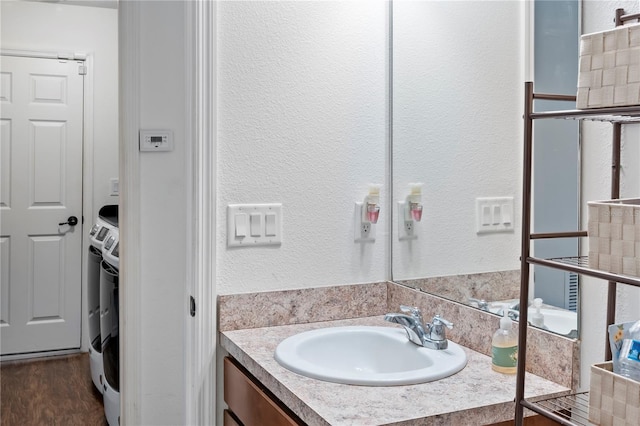 bathroom featuring wood-type flooring and vanity