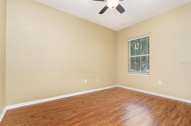 unfurnished room featuring wood-type flooring and ceiling fan