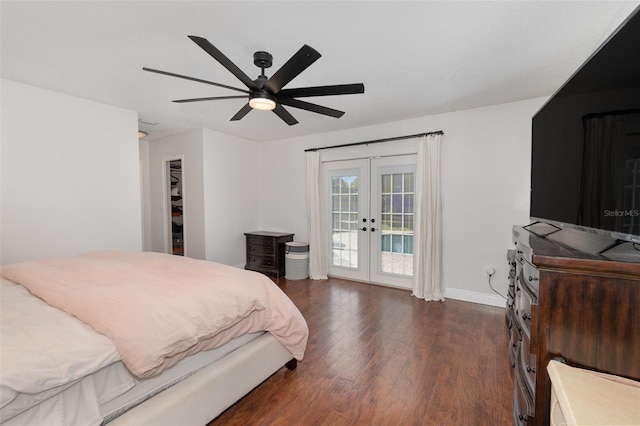 bedroom featuring ceiling fan, access to exterior, dark wood-type flooring, and french doors