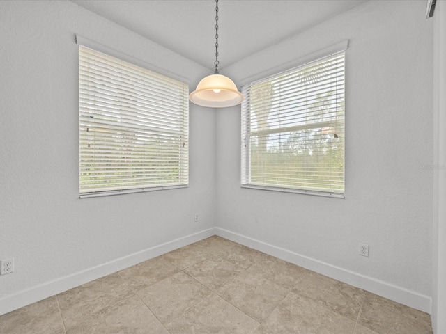 view of tiled spare room