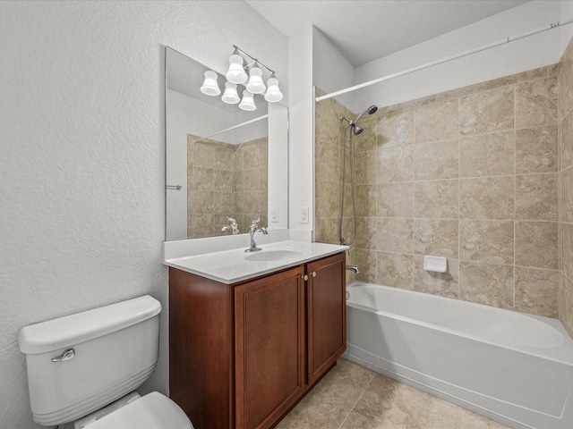 full bathroom featuring toilet, tile patterned flooring, vanity, and tiled shower / bath