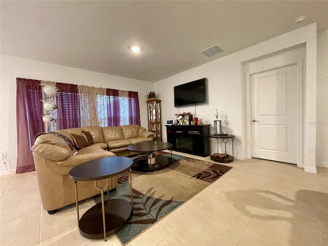 living room featuring light tile patterned floors