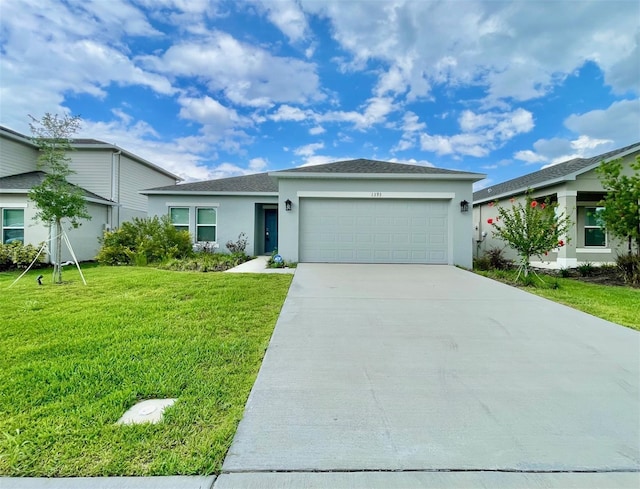 1393 Asher Mason Ave, Kissimmee, FL 34744 - view of front of property featuring a garage, stucco siding, a front yard, concrete driveway, and roof with shingles