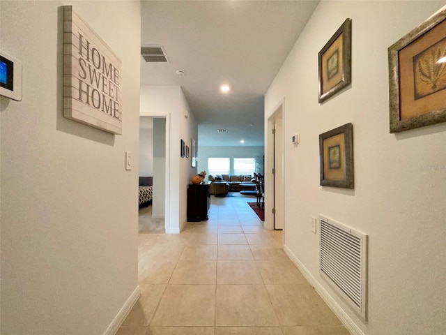 1393 Asher Mason Ave, Kissimmee, FL 34744 - hall with light tile patterned floors, baseboards, and recessed lighting