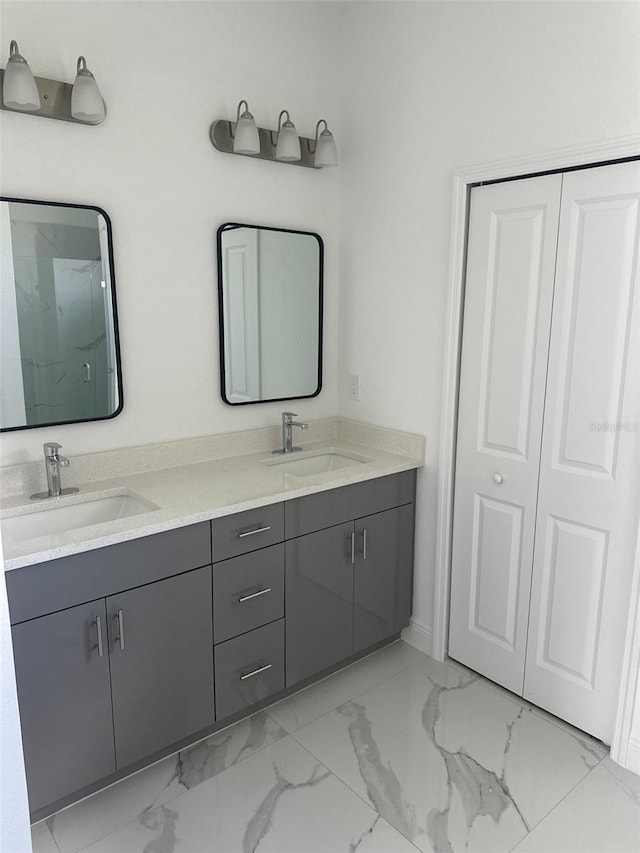 bathroom with vanity and an enclosed shower