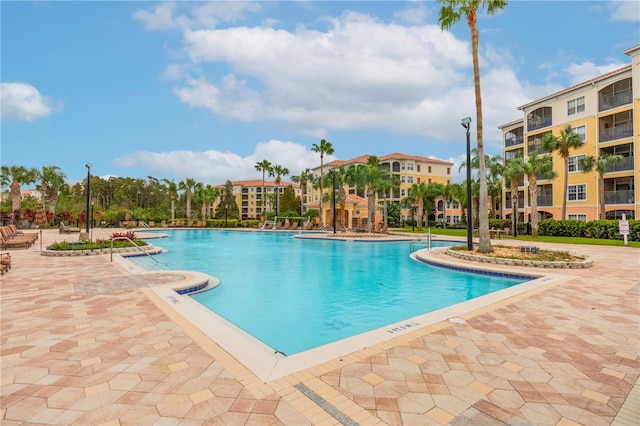 pool featuring a patio area