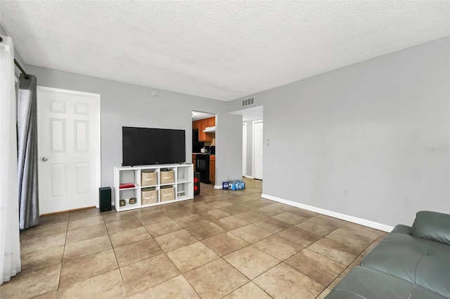 tiled living room with a textured ceiling