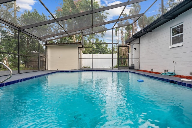 view of pool with a lanai