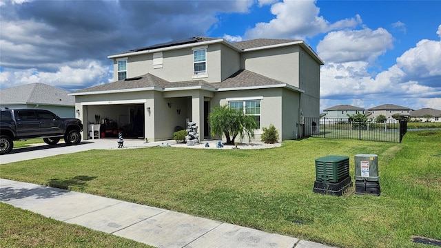 view of front facade featuring a front lawn and a garage