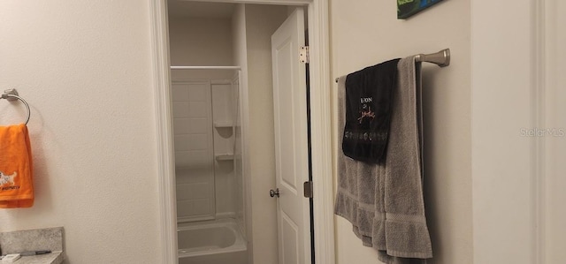 bathroom featuring washtub / shower combination