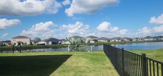 view of yard with a water view