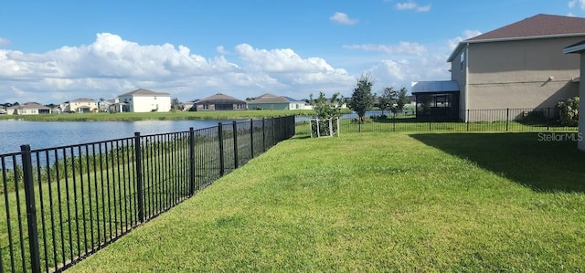 view of yard with a water view