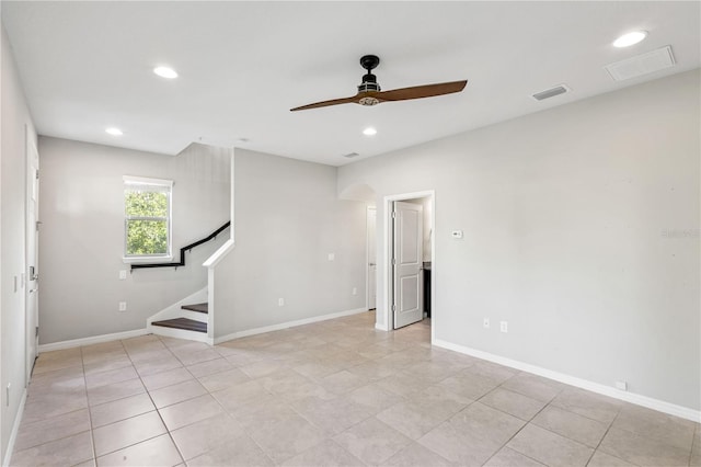 594 Piazza Pt, Oviedo, FL 32765 - empty room featuring a ceiling fan, stairs, recessed lighting, baseboards, and light tile patterned flooring