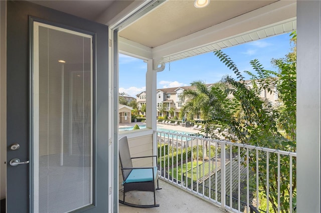 594 Piazza Pt, Oviedo, FL 32765 - balcony with view of pool area and a residential view