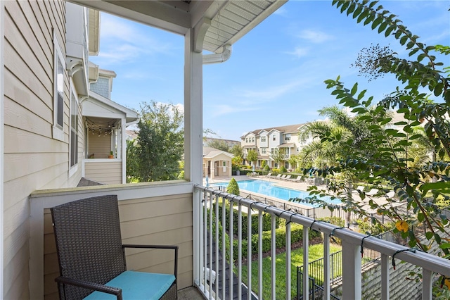 594 Piazza Pt, Oviedo, FL 32765 - balcony with view of pool area and a residential view