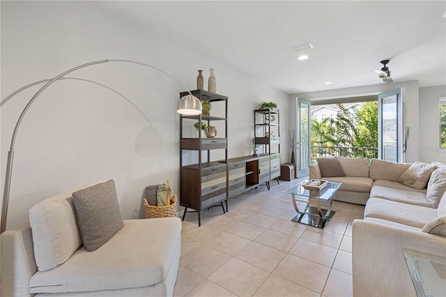 living room featuring light tile patterned floors