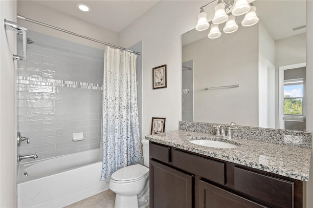 full bathroom with vanity, shower / tub combo, a chandelier, tile patterned floors, and toilet