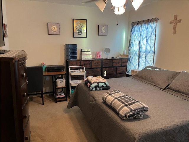 bedroom featuring ceiling fan and carpet floors