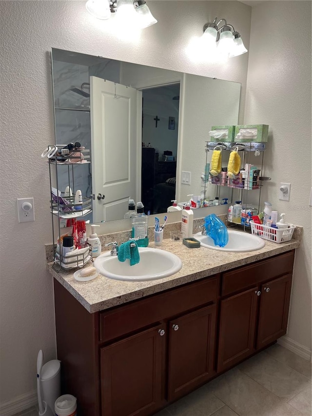 bathroom with vanity and tile patterned floors