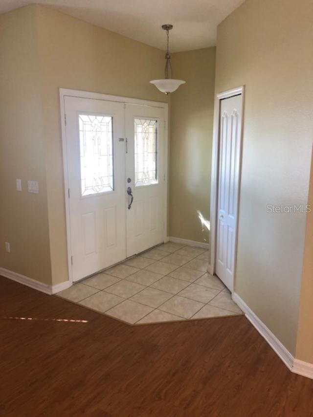 entrance foyer featuring light wood-type flooring