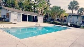 view of pool featuring a patio