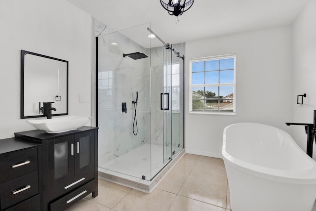 bathroom featuring tile patterned flooring, vanity, and independent shower and bath