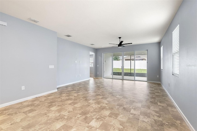 spare room with ceiling fan