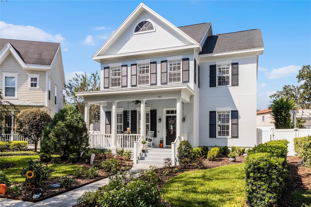 view of front of house featuring a front lawn and a porch