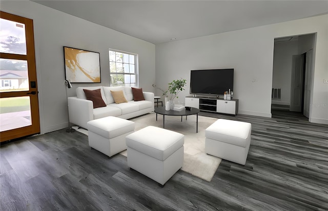 living room with dark hardwood / wood-style flooring