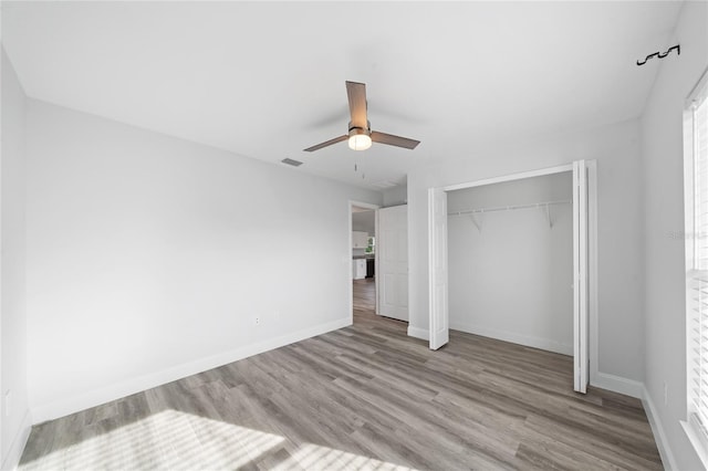 unfurnished bedroom featuring a closet, ceiling fan, and light hardwood / wood-style floors