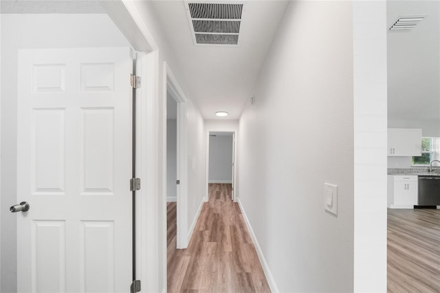 hall featuring light hardwood / wood-style flooring