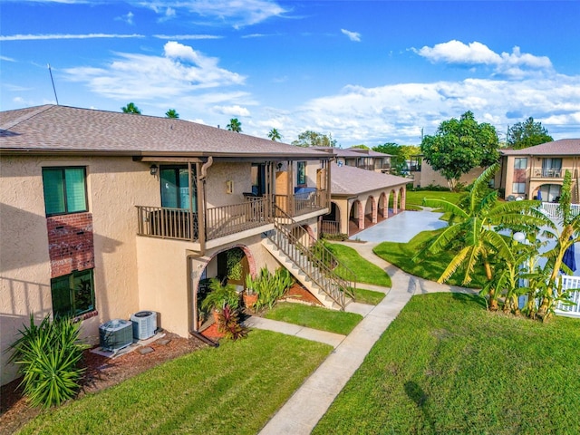 surrounding community featuring a yard and a patio area