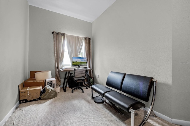 living area featuring carpet floors and lofted ceiling