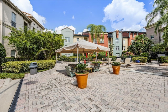 view of property's community featuring a patio area