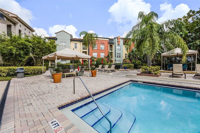 view of swimming pool featuring a patio