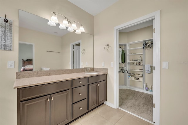 bathroom featuring vanity and tile patterned flooring