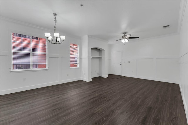 unfurnished living room with ceiling fan with notable chandelier, dark hardwood / wood-style floors, and crown molding