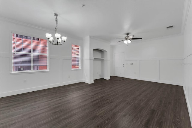 unfurnished living room with a decorative wall, ceiling fan with notable chandelier, arched walkways, ornamental molding, and dark wood-style floors