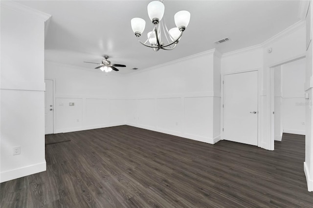 unfurnished room featuring dark wood finished floors, visible vents, ornamental molding, wainscoting, and ceiling fan with notable chandelier
