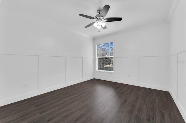 unfurnished room featuring ceiling fan, crown molding, and dark wood-type flooring