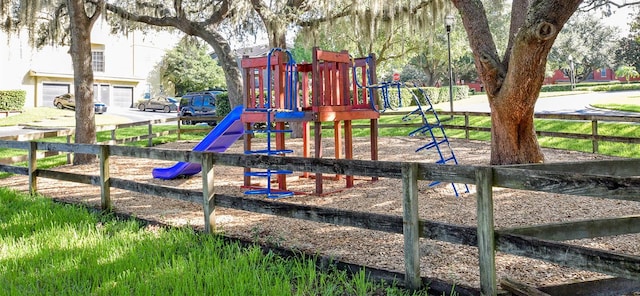 community jungle gym with fence