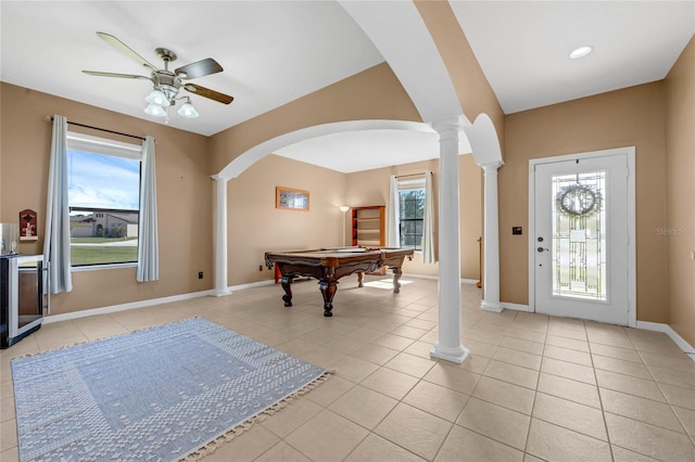 recreation room featuring light tile patterned floors, billiards, decorative columns, and a wealth of natural light