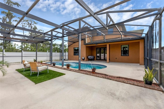 view of pool featuring a patio and a lanai