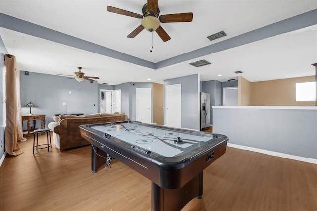 recreation room featuring ceiling fan and wood-type flooring