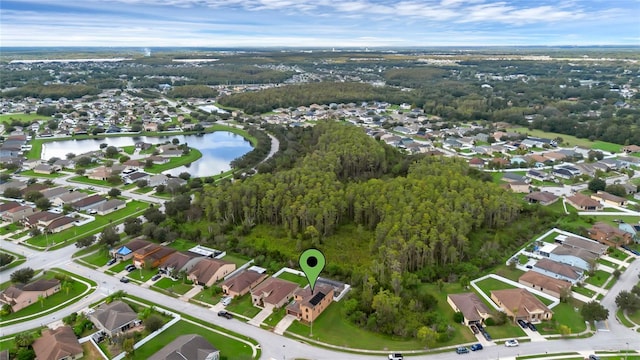 bird's eye view featuring a water view and a residential view