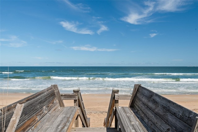 view of community featuring a view of the beach and a water view